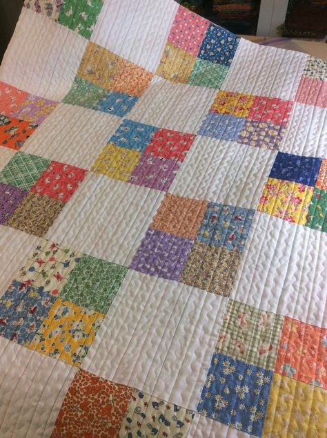 A pretty quilt made for charity.  Love the quilt stitching!  | Mama Spark's World Quick And Easy Quilts Simple, Sew Fresh Quilt Patterns, Quilts Made From Charm Squares, Quilt Patterns For Busy Fabric, 4 Patch Quilt Patterns Free, Fast Quilts To Make, Simple Quilts Patterns, 4 Square Quilt Pattern, Old Fashioned Quilts