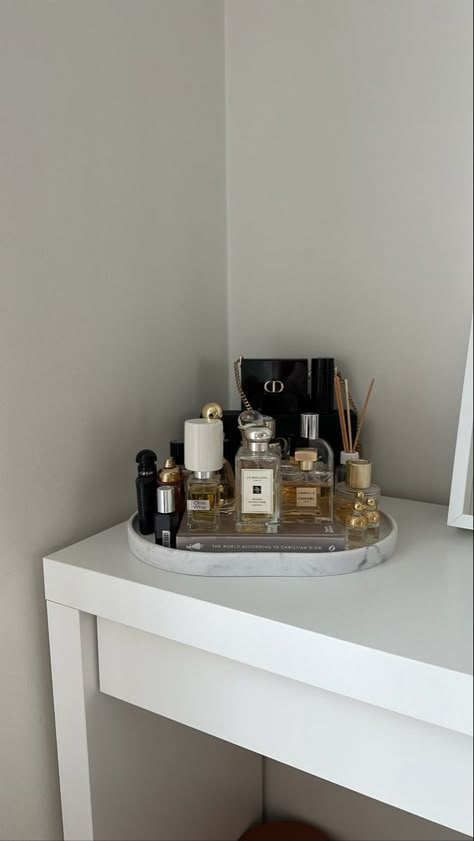 My vanity 🤍 Marble tray 🤍 Perfumes Simple Vanity Decor, Perfume Corner In Bedroom, Perfume On Vanity, Perfume Tray On Dresser, Beauty Table Aesthetic, Makeup Tray Aesthetic, Perfume Decoration Ideas, Marble Perfume Tray, Apartment Bathroom Inspo Aesthetic