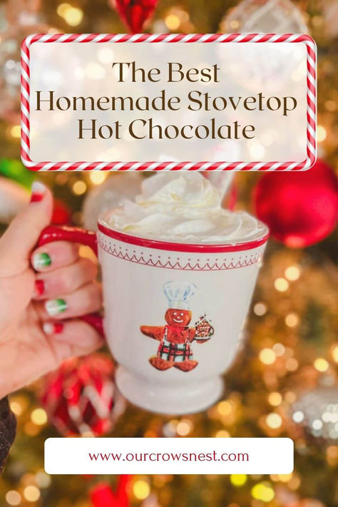 a Christmas mug being held up in front of a Christmas tree filled with homemade stovetop hot chocolate. Stovetop Hot Cocoa, Stove Top Hot Cocoa, Bulk Hot Chocolate Recipe, Evaporated Milk Hot Chocolate, Stove Hot Chocolate, Stove Top Hot Chocolate Easy, Hot Chocolate Recipes Stovetop, Hotchocolate Homemade Recipe, Best Hot Chocolate Recipe Homemade