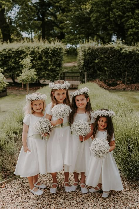 Four flower girls in white dresses and white ballet shoes with small round gypsophila bouquets with matching gypsophila flower crowns Ghost Wedding, Kids Bridesmaid Dress, Gypsophila Bouquet, Gypsophila Wedding, Flower Girl Bouquet, Flower Girl Crown, Wedding Girl, White Flower Girl Dresses, Wedding Dresses For Girls