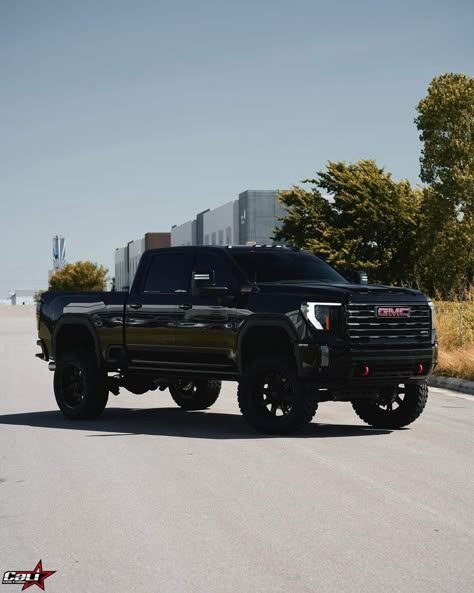 Gmc Sierra Blacked Out, Lifted Denali Hd 2500, Gmc Black Truck, Black Gmc Truck Lifted, Black Gmc Denali Truck, Gmc Denali Truck Lifted, Nice Trucks Country, Black Lifted Trucks, 2024 Trucks