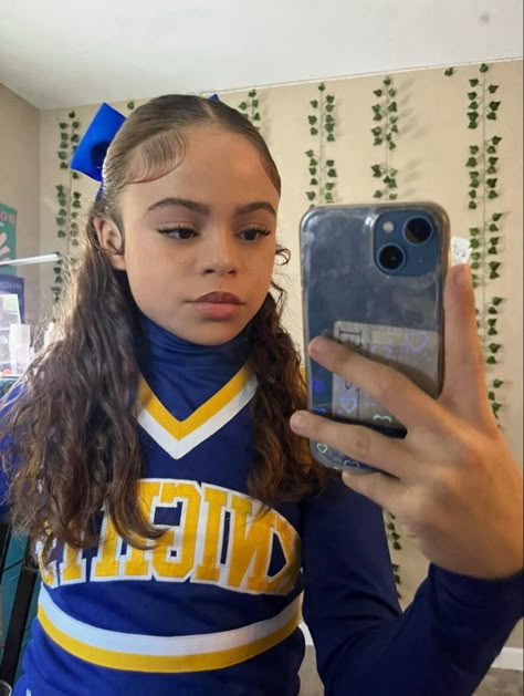 Cheerleading Half Up Half Down Hair, Cheerleading Hairstyles Curly Hair, Drill Team Hairstyles, Low Half Up Half Down Cheer, Cheerleader Half Up Half Down Hair, Curly Hairstyles For Cheerleaders, Half Up Half Down Hair Cheerleading, Curly Hair Cheerleader, Cheer Half Up Half Down Hair With Bow