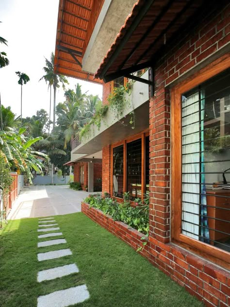 We travel to Kerala to visit the striking brick house of Trivandrum! | Goodhomes.co.in Exterior Color Palette, Brick Construction, Kerala House, Indian Home Design, Villa House, Kerala Houses, Kerala House Design, Brick Architecture, Village House Design