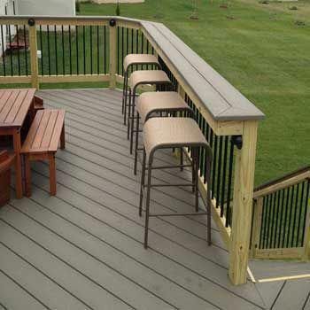 A PLACE TO EAT AND HANG OUT - Adding a bar top over your deck railing is a simple & affordable way to add extra seating + entertainment space. Reling Design, Deck Bar, Patio Railing, Deck Railing Design, Deck Seating, Building A Porch, Patio Deck Designs, Wooden Deck, Deck Building