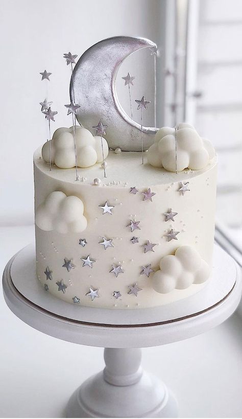 4. White and Silver Star Baby Shower Cake Whether you’re looking for birthday cake, graduation cake, bridal shower, baby shower or any celebration cake.  We’ve... Moon Baby Shower Cake, Moon Stars Baby Shower, Cloud Cake, Moon Baby Shower, Amazing Wedding Cakes, Baby Gender Reveal Party, Baby Birthday Cakes, Cake Decorating Designs, Baby Shower Inspiration