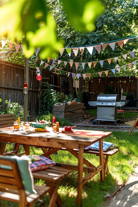 A sunny backyard with a picnic table, chairs, BBQ grill, festive bunting, and hanging lanterns. Perfect setup for a summer gathering. Backyard Bbq Photoshoot, Park Bbq Party, Manifest Proposal, Elegant Bbq Party Decor, Barbecue Birthday Party Ideas, Pool Cookout, Hosting A Bbq Party, Bbq Birthday Party Ideas, Barbecue Party Ideas