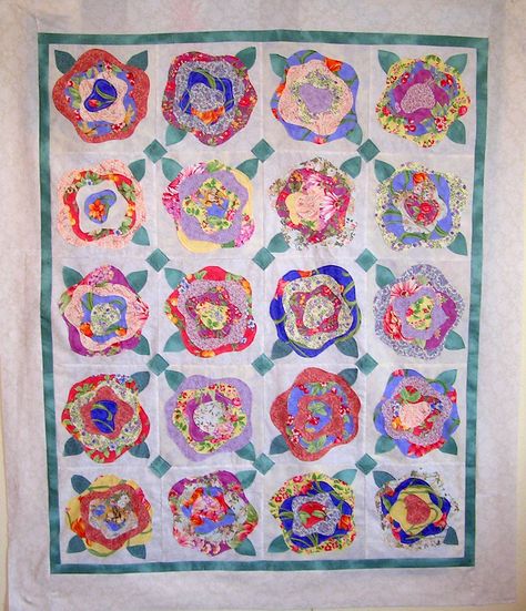 This has been my  "easy sewing at night"  project for the summer.  The pattern is called "French Roses" and it is the one I saw while we w... French Roses Quilt, Rose Quilt Block, Watercolor Quilts, Rose Quilts, Roses Quilt, Giraffe Quilt, Quilt Flowers, Floral Quilts, French Quilt