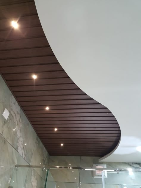 Wooden And Pop False Ceiling, Pvc Celling Design Bedroom, Wooden Pvc Ceiling Design, Car Parking False Ceiling Design, Porch False Ceiling Designs, Small False Ceiling Design, Pvc False Ceiling Design For Living Room, Vox Ceiling Design, Balcony Pop Ceiling Design