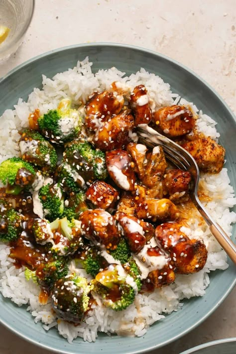 Fill up on satisfying protein and flavor with these Sticky Chicken Rice Bowls. Between the bowl base, the delicious sticky sauce, and the spicy mayo drizzle, you can expect this to become your new favorite meal. Fluffy Brown Rice, Homemade Soy Sauce, Sticky Sauce, Health Meals, Bowls Recipes, Chicken Rice Bowls, Power Bowl, Avocado Crema, Sticky Chicken