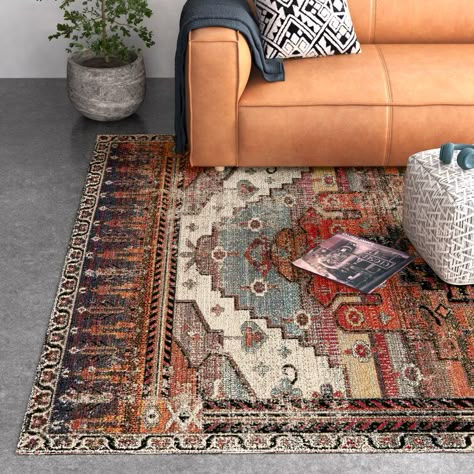 Orange And Brown Area Rugs, Western Rugs Southwestern Style, Orange Area Rug Living Room, Living Room Rug With Leather Couch, Earth Tone Decor Living Room, Leather Couch And Rug, Fall Color Living Room, Western Rugs Living Room, Boho Area Rugs In Living Room