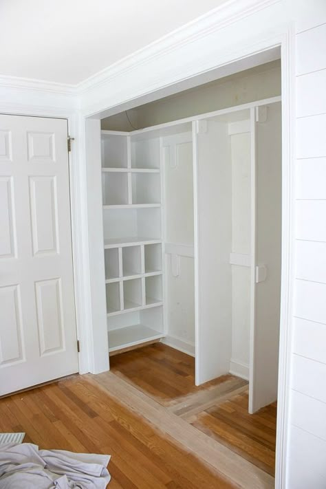 Closet makeover in progress (bifold doors are removed!) - love the cubbies on the end! #closet #makeover #organize #organizing #organization #drapes Modern Minimalist Cozy Bedroom, Armoire Built Into Wall, Side By Side Closet Remodel, Remove Closet Wall, Closet Design Layout Small Sliding Doors, Wide Closet Organization, Small Closet Makeover On A Budget, One Wall Closet, Wallpaper In Closet