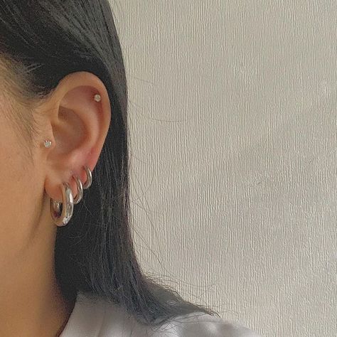 Silver Earrings 3 Holes, Silver Hoop Piercings, Silver Earrings Set Up, Minimal Ear Piercings Silver, Silver Earrings Layered, Mix Gold And Silver Earrings, Silver Hoop Earrings Chunky, Layered Silver Earrings, Silver Hoop Earrings Stack