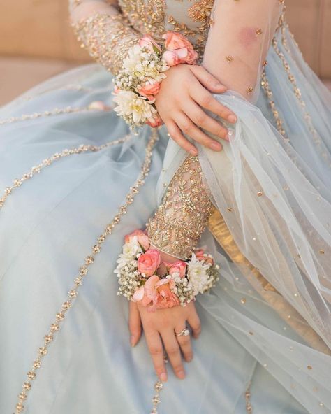 Soft Blue Outfit, White Rose Corsage, Haldi Bride, Bridal Shop Ideas, Bride Fashion Photography, Fresh Flower Jewelry, Bridal Mehndi Dresses, Wedding Flower Jewelry, Indian Wedding Favors