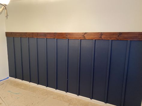 Navy Wood Paneling, Lower Wall Wood Paneling Ideas, Navy Blue Half Wall Bedroom, Blue Beadboard Ceiling, Navy Blue Wood Panel Wall, Navy Wainscoting Hallway, Navy Batten Board Wall, Navy Wall With Wood Slats, Navy Half Wall