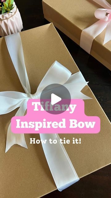 The Shortcut Girl • Tips & Tricks for Home + General Life on Instagram: "This bow is T.I.P Timeless. Iconic. Perfect  #wrapping gifts #giftwrappinghacks #bowsbowsbows #giftwrapping #giftboxideas #wrappinghacks #giftwrappingideas #giftwrapped #presentwrapping #bowtutorial #bowmaking #giftwrap" Tie Bow On Present, How To Tie A Bow Around A Present, Tying A Gift Bow, Box Bow Wrapping, How To Tie A Tiffany Bow Gift Wrapping, How To Wrap A Robe As A Gift, Tying Gift Bows, Bows On Gifts Wrapping Ideas, How To Wrap A Gift Box With Ribbon