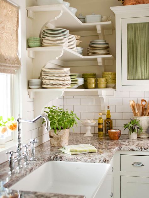 You can boost your kitchen storage with open shelving ideas! Click through for more ideas here: http://www.bhg.com/home-improvement/remodeling/budget-remodels/25-home-improvement-ideas-under--150/?socsrc=bhgpin101414boostkitchenstorage&page=1 Irish Kitchen, Budget Remodel, Farmhouse Renovation, Jensen Beach, Kitchen Solutions, Kitchen Corner, Bohol, Deco Vintage, Design Del Prodotto