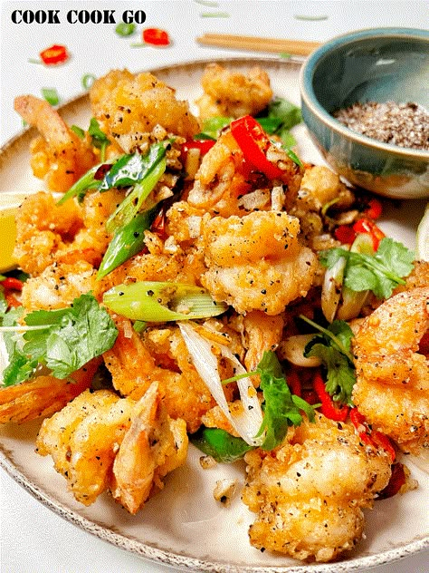 Salt and Pepper Shrimp is crispy outside and juicy inside. They are seasoned to perfection. Every bite makes you crave for more. Sweet And Sour Prawns, Salt And Pepper Shrimp, Appetizer Dinner, Pepper Shrimp, Chinese Cooking Wine, Crispy Shrimp, Large Shrimp, Shrimp Dishes, Fried Shrimp