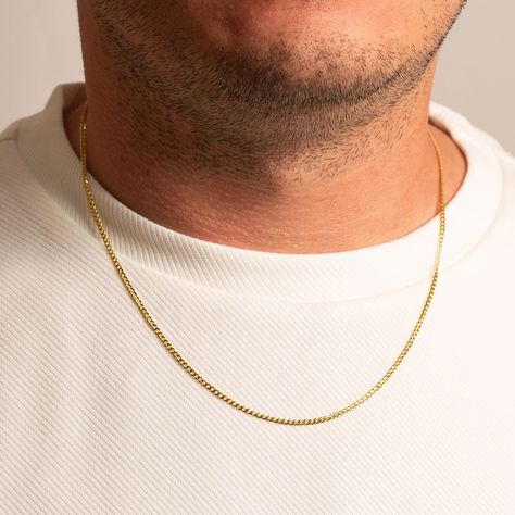 Secure Lobster Claw Clasp. Available in 16”, 18”, 20”, 22” and 24". Chain Width: 1.67mm. The Men's Miami Cuban Curb Chain Link Necklace is a classic piece that exudes strength and sophistication. With its iconic Cuban link design, this necklace offers a bold yet refined look, ideal for those who appreciate timeless style and quality. The solid, interlocking links create a sleek, substantial chain that sits comfortably around the neck, making it a versatile choice for daily wear or special occasions. Designed to complement any outfit, from casual to dressy, this necklace is both durable and effortlessly stylish. The Men's Miami Cuban Curb Chain Link Necklace is a powerful statement piece and a thoughtful addition to any jewelry collection, embodying a blend of practicality and enduring eleg Link Design, Miami Cuban, Cuban Link, Chain Link Necklace, Curb Chain, Link Necklace, Lobster Claw, Chain Link, Timeless Style