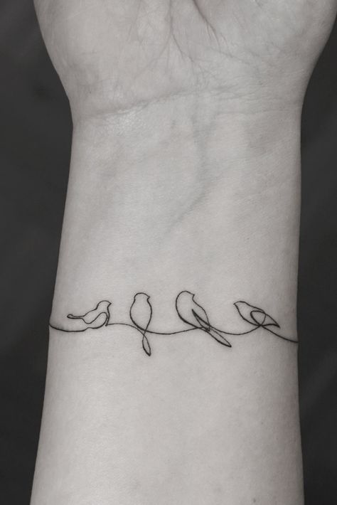 Tattoo Artist Selection Guide: How To Find The Right One For You Fine Line Bird On Branch Tattoo, Family Line Tattoo Ideas, Bird Mom Tattoo, Bird Flight Tattoo, Sun And Birds Tattoo, Bird Bracelet Tattoo, Family Of Three Tattoo, Simplistic Bird Tattoo, Bird Family Tattoos For Women