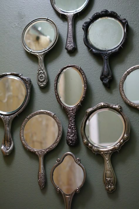 Vintage wall mounted hand held mirror collection. Thrift Board, Hand Mirrors, Smart Tiles, Living Vintage, Big Mirror, Antique Mirrors, Large Wall Space, Vintage Mirrors, Tall Ceilings