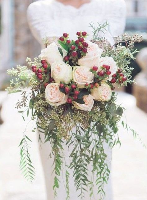 A splash of red makes this bouquet stand out amidst the sea of white. You could use winterberries, holly berries or cranberries. If blue is your wedding color of choice, go for juniper berries instead. A little bit goes a long way with these. Pepper them in among the white roses or baby’s breath. | Winter Berry Bouquet | Seasonal Favorites: 5 Winter Wedding Bouquets Holiday Bouquet, Winter Wedding Bouquet, Bouquet Bride, Winter Bouquet, Winter Wedding Flowers, December Wedding, Winter Wedding Inspiration, Winter Wonderland Wedding, Wedding Boho