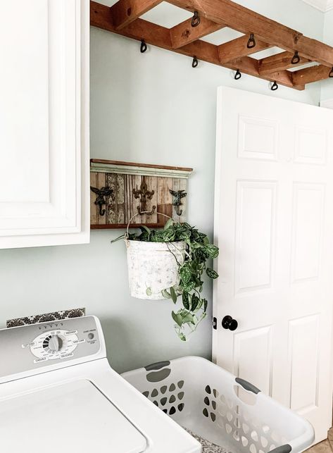 6 Budget Friendly Ways To Update Your Dated Laundry Room | Bless This Nest Laundry Room Window Ideas, Laundry Room Lighting Ideas, Laundry Room Paint, Laundry Room Update, Mudroom Makeover, Laundry Room Lighting, Laundry Room Doors, Mudroom Decor, Farmhouse Laundry Room