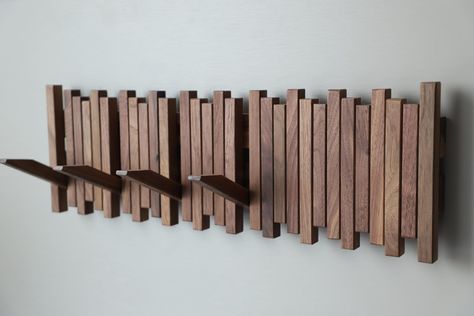 PRICES MAY VARY. 🌟HANDMADE SOLID WOOD&UNIQUE DESIGN-Modern Coat Rack designed with natural wood and handmade with a unique flip up design so the hooks stay up when not in use.（Built in magnetic design 🌟DECORATIVE & VERSATILE-Beautiful solid wood texture to match any décor and work in any room. With multiple wall hook options, these entryway storage racks can be used as wig storage, clothes or holding all your ball caps as a hat rack 🌟MODERN MINIMALIST -To keep the design minimalist and clean Hanging Blankets On Wall, Entryway Wall Storage, Slat Wall Storage, Piano Coat Rack, Entry Coat Rack, Hardwood Wall, Coat Rack Wall Mount, Wall Hook Rack, Wall Hats