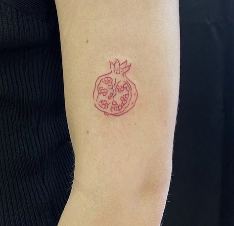 Pomegranate Stamp Tattoo, Artsy Fine Line Tattoo, Pommegrenade Tattoo, Red Pomegranate Tattoo, All Things Must Pass Tattoo, Red Line Tattoos, Pomegranate Tattoo Simple, Apricot Tattoo, Adrianne Lenker Tattoo