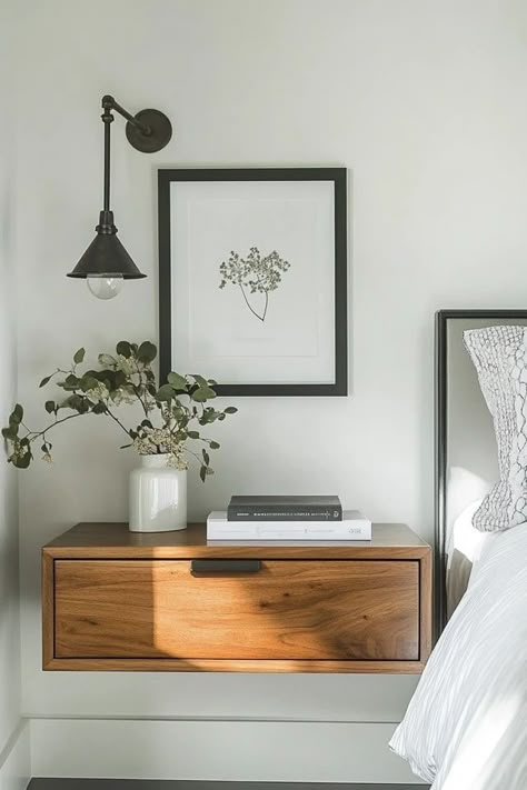 "Maximize space and style with floating nightstands! 🛏️✨ Perfect for creating a sleek, modern look in your bedroom. 🌟✨ #FloatingNightstand #BedroomDesign #SpaceSaving" Floating Nightstand Bedroom Ideas, Floating Shelves For Nightstands, Hanging Light Over Nightstand, Floating Nightstands Bedroom, Floating Shelves Next To Bed, Floating Night Stand Ideas, One Nightstand Bedroom Layout, Floating Side Tables Bedroom, Floating Nightstand Bedroom