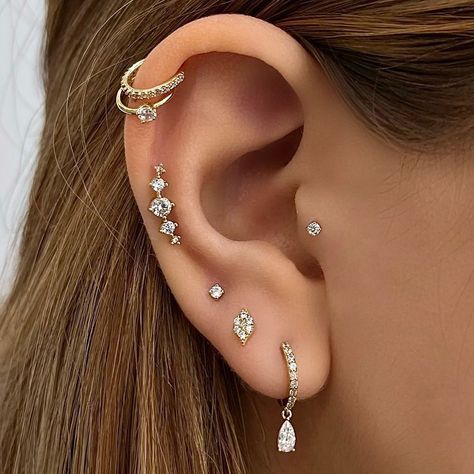 LULUS on Instagram: “Final Hours Left on Our Holiday Sale! Up to 40% off stylist picked Jewelry!! Click the link in the Bio ✨ . 💎 Come Get Pierced & Styled…” Multiple Piercings Earrings, Ear Art, Helix Piercing Jewelry, Pretty Ear Piercings, Hinged Ring, Ear Style, Piercings Unique, Detailed Jewelry, Gold Stone