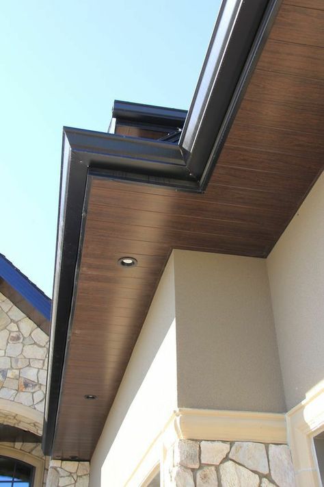 Wood Soffits Exterior, Wood Eves Exterior, Black Fascias And Soffits, Wood Eaves Exterior, Wood Soffit Exterior Modern, Modern Soffit Exterior, Wood Look Soffit Exterior, Black Eaves Exterior, Soffit Colors Exterior