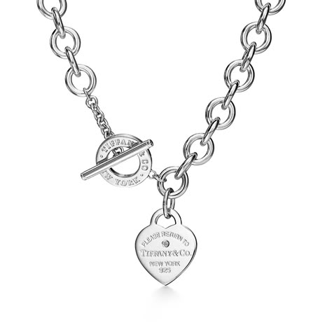 Return to Tiffany® Heart Tag Necklace in Silver with a Diamond, Medium | Tiffany & Co. US Tiffany Chunky Necklace, Jewelry Silver Necklaces, Silver Tiffany Necklace, Heart Tag Toggle Necklace, Tiffany Heart Necklace, Return To Tiffany Necklace, Tiffany Co Necklaces, Heart Necklace Tiffany, Tiffany Setting