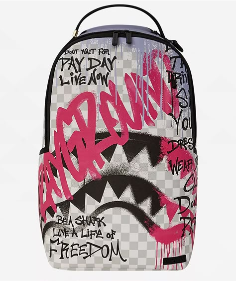 The Spray Poetry backpack arrives from Sprayground in a classic sublimated print showcasing graffiti-themed graphics with affirming phrases for a street-centric look. Lending organization with style, the bookbag's design features a velour-lined main compartment with a 15" interior laptop sleeve and two zippered pouches, a small vertical zip pouch on the bag's front, and a discreet stash pocket with zip closure hiding in the ergonomic mesh padding on the back. Ready for anything Pretty Backpacks, Cute Backpacks For School, Spray Ground, Shark Backpack, Pretty School Supplies, Stylish School Bags, School Bag Essentials, My Style Bags, Girly Bags