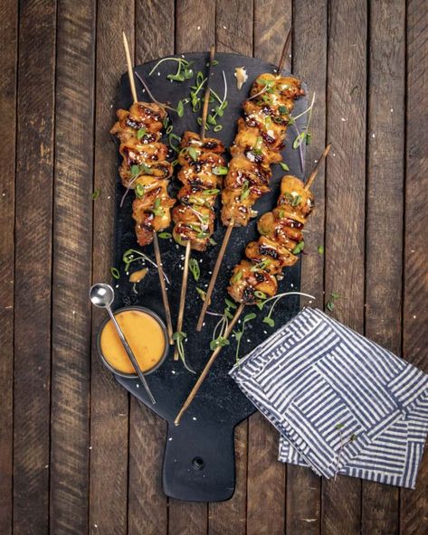 Grilled Bang Bang Chicken Skewers are bursting with flavor. Tangy, spicy, and sweet, these skewers are an instant hit at any barbecue. Spicy Chicken Skewers, Hot And Spicy Chicken, Bang Bang Chicken Skewers, Thai Chili Sauce, Bang Bang Chicken, Grilled Chicken Skewers, Honey Sesame, Chicken With Olives, Onion Chicken