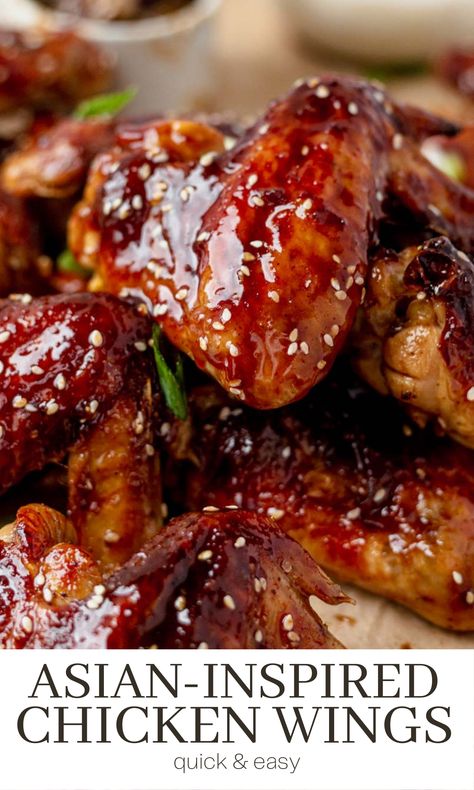 These Asian chicken wings are crispy and sticky thanks to a secret (but simple) ingredient and sweet and (slightly) spicy sauce. They make a delicious addition to any game day spread but are easy enough to enjoy for dinner with a side of veggies. Mongolian Chicken Wings, Sticky Chinese Chicken Wings, Asian Wing Sauce Recipes, Sweet And Sticky Chicken Wings, Sweet And Spicy Asian Sauce, Chicken Wings Asian Style, Asian Chicken Wings Recipe, Saucy Chicken Wings, Asian Chicken Sauce