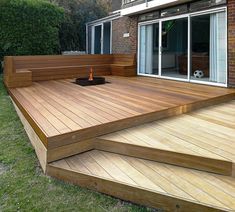 Back Deck Off House, Back Decking Ideas, Small House Deck Ideas, Larch Decking Ideas, Tiered Back Deck, Deck Ideas Without Railings, Small Modern Deck Ideas, Deck Back Of House, Yard Deck Ideas Backyards