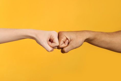 International relationships. People making fist bump on orange background, closeup royalty free stock image Male Background, Instagram Graphic Design, Fist Bump, Instagram Graphic, Design Posters, Orange Background, Graphic Design Posters, Bump, Stock Images Free