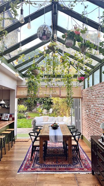 Meg Lambert on Instagram: "• the brief • @petershamnurseries but make it *kitchen*🍃 It took: ~ 10 months ~ A few breakdowns ~ 5000 tins of @lick paint ~ Multiple measuring mistakes ~ And approx 32,847 cups of coffee But we managed to transform this white box conservatory into our kitchen of dreams 🤍 I didn’t just want to bring the outdoors in, I wanted it to *feel* like the outdoors, indoors. A few more plants to go(😰) but I think we’re just about getting there. Follow for more of White Conservatory Ideas, Crittal Style Conservatory, Conservatory Dining Table, Atrium Dining Room, Upvc Conservatory Makeover, Glass Kitchen Extension, Converted Conservatory, Bungalow Conservatory, Conservatory Dining Room Ideas