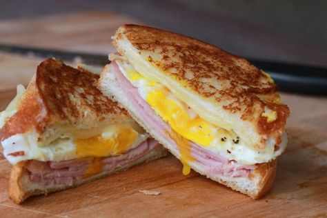 This Ham and Egg Grilled Cheese Sandwich is perfect for breakfast or dinner. It is loaded with ham, delicious cheese and a perfectly cooked egg. Gourmet Grilled Cheese Sandwich Recipes, Egg Grilled Cheese Sandwich, Ham Grilled Cheese, Ham And Egg Sandwich, Pizza Grilled Cheese Sandwich, Gourmet Grilled Cheese Sandwich, Grilled Ham And Cheese, Grill Cheese Sandwich Recipes, Egg And Cheese Sandwich