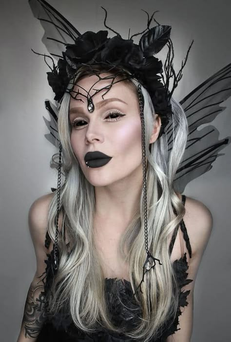 33 Magical Fairy Makeup Ideas That Are Out Of This World 30 Witch Crown Headpieces, Dark Fairy Costume Halloween, Dark Fairy Make Up, Gothic Fairy Costume, Black Fairy Costume, Dark Elf Makeup, Dark Fae Costume, Dark Elf Costume, Dark Fairy Outfit