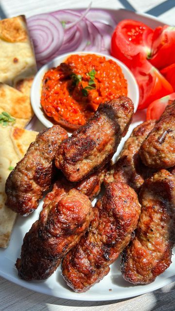 Snejana Andreeva on Instagram: "Comment ✨RECIPE✨ and I’ll send the recipe to your DMs — (Instagram ONLY) If you’re watching on Facebook, read below ⬇️ for the link 🔗  
⠀⠀⠀⠀⠀⠀⠀⠀⠀⠀⠀  
It’s no secret that in the Balkans, we loooove our meat! Cevapi, or Ćevapi (if you want to be legit 😉), is a staple Balkan dish that’s not only a popular street food but also a must-have at every Balkan gathering or barbecue. In Bulgaria, we refer to these small meat sausages as Kebapcheta (same ingredients, but slightly longer to resemble a kebap), and I have been enjoying these ridiculously tasty little meat sausages since I was a mini Sneji. 
⠀⠀⠀⠀⠀⠀⠀⠀⠀⠀⠀
Extra Notes 🗒️ 
1. The egg is OPTIONAL so if you’re egg-free, leave it out. Depending on the quality or type of meat you use, I like to add an egg or egg Food Aethstetic, Balkan Food, The Balkans, An Egg, Egg Free, The Egg, Street Food, Bulgaria, The Recipe