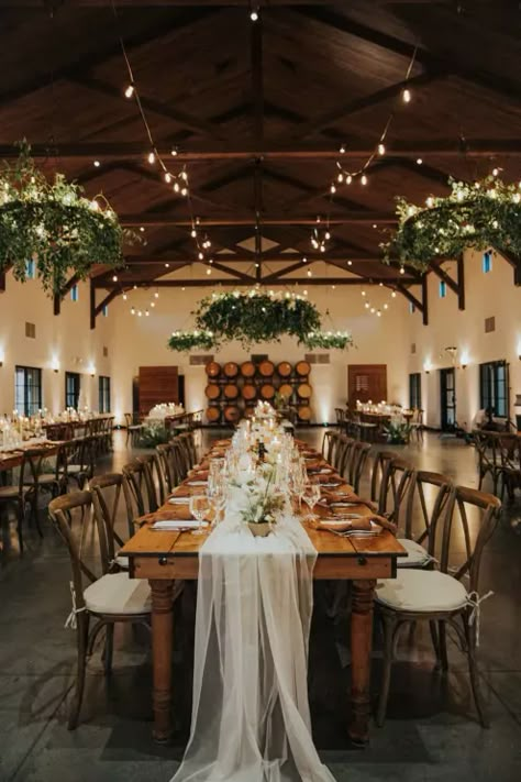 Viansa Sonoma Winery Wedding indoor reception with floating florals | Photos by JJP Studio Winery Reception Ideas, Wedding Ideas Winery Vineyard, Indoor Winery Wedding, Indoor Wedding Ideas On A Budget, September Vineyard Wedding, Winery Wedding Inspiration, Winery Wedding Table Decor, Winery Wedding Fall, Vineyard Wedding Flowers