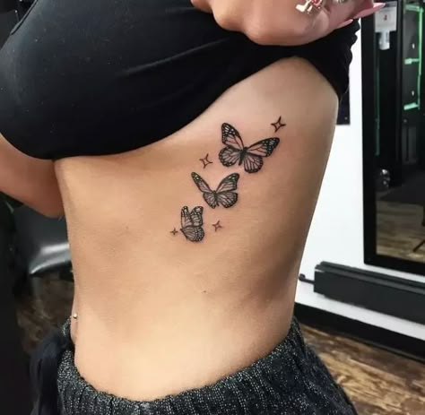 22 Elegant Butterfly Tattoo Design & Ideas For Men and Women Butterfly Tattoo Design, Rib Tattoos For Women, Ribcage Tattoo, Pretty Hand Tattoos, Butterfly Tattoos For Women, Petite Tattoos, Pretty Tattoos For Women, Dope Tattoos For Women, Small Hand Tattoos