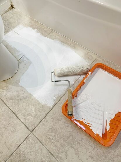 Are you looking for a quick and cheap way to make over your bathroom? try this easy DIY idea and paint over old tile. This simple upgrade will make your builder grade bathroom look more expensive ad is perfect for old tiles and small bathrooms. check out the before and after photos for inspiration. #diy #bathroom #makeover Bathroom Floor Makeover, Diy Bathroom Floor, Builder Grade Bathroom, Wood Valances For Windows, Old Tiles, Diy Dining Room Table, Floor Makeover, Building A Kitchen, Bathroom Remodels