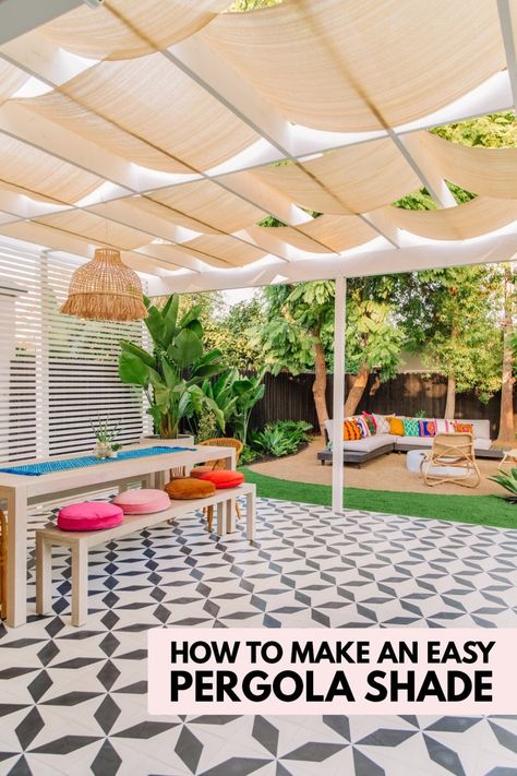 Backyard patio with patterned tile, long table and pergola with shade Pergola With Shade, Pergola Shade Diy, Designing A Garden, Retractable Pergola Canopy, Garden From Scratch, Pergola Shade Cover, Easy Patio, Patio Sun Shades, Pergola Diy