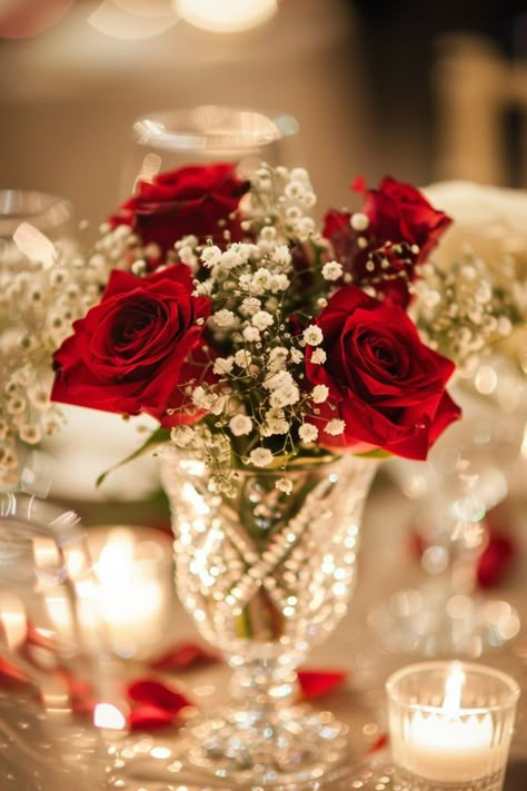 Timeless and versatile, floral centerpieces allow you to showcase your wedding's personality. Click for more ideas. Centerpieces Wedding No Candles, Red Roses Centerpieces Birthday, Red White Floral Arrangements, Red Wedding Theme Summer, Cherry Centerpiece Ideas, 40th Anniversary Centerpieces, Red And Gold Wedding Centerpieces, Red Roses Table Decor, Red And White Wedding Centerpieces