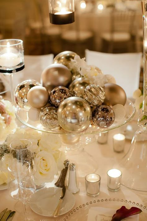 Ornaments at a winter wedding make a chic centerpiece that's also inexpensive. Glam Wedding Centerpieces, Winter Wedding Centerpieces, New Years Wedding, Nye Wedding, New Years Eve Weddings, December Wedding, Winter Wonderland Wedding, Wedding Centerpieces Diy, Wedding Winter