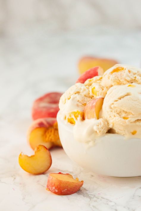 Peaches and cream is a classic for very good reasons. It's a dessert that's incredibly simple but nonetheless scrumptious. Here's my take on this classic. Peach Ice Cream Aesthetic, Peach With Ice Cream, Fruit Ice Cream Aesthetic, Ice Creme Aesthetic, Fresh Fruit Ice Cream, Peaches And Cream, Buttermilk Ice Cream, Peach Ice Cream Recipe, Homemade Peach Ice Cream