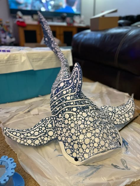 This was right after i finished painting it <3 I’ll probably post the work in progress photos later Paper Mache Sea Creatures Art Projects, Stingray Paper Mache, Cardboard Whale Shark Template, Wall Shark Cardboard, Diy Whale Shark, Diy Room Decor Ocean Theme, Paper Mache Manta Ray, Paper Mache Stingray, Whale Shark Paper Mache