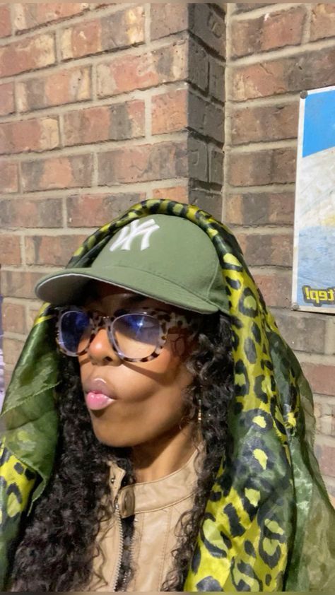 Head Scarf Streetwear, Head Scarf And Hat, Headscarf Styles Outfit, Silk Scarf Outfit Black Women, Scarf Over Fitted Hat, Hat With Scarf Outfit, Scarf Over Hat Outfit, Hat And Scarf Combo, Hat With Scarf On Top